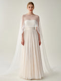 White pleated gown with sheer cape overlay, off-shoulder neckline