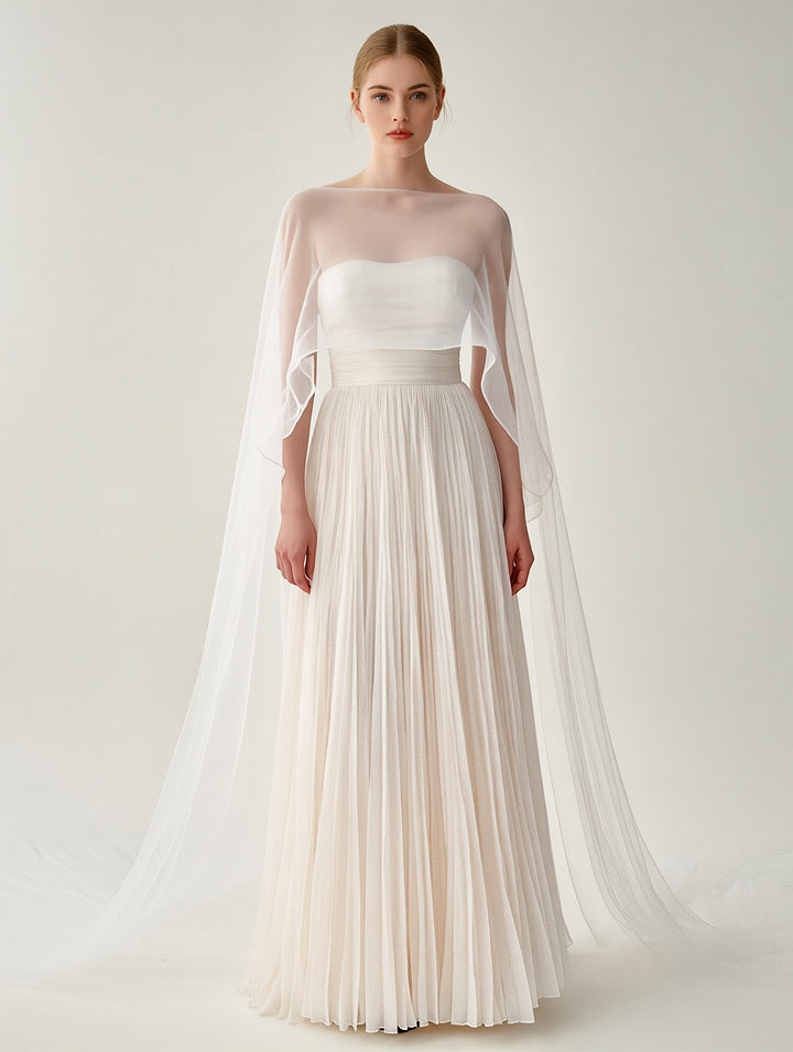 White pleated gown with sheer cape overlay, off-shoulder neckline