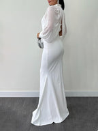 White maxi dress with sheer beaded sleeve and high neck ruffle