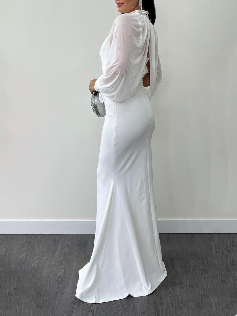 White maxi dress with sheer beaded sleeve and high neck ruffle