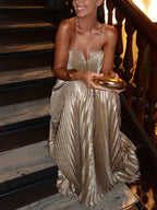 Champagne metallic strapless tube maxi dress with sweetheart neckline and pleated skirt