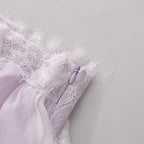 Lavender lace ruffle and floral appliqué detail on maxi slip dress