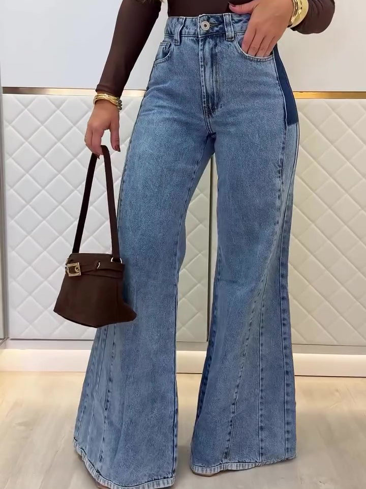 Light blue high-waist flared jeans with belt loops, front button, and long wide flare