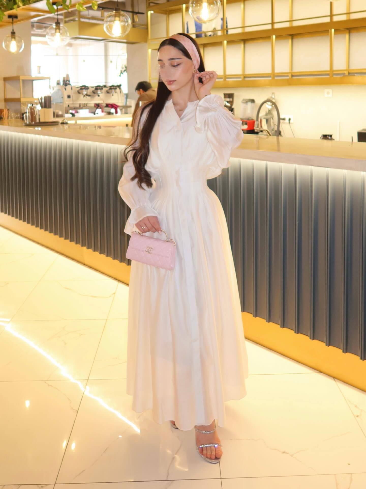 White puff-sleeve button flowy dress with V-neck and gathered waist