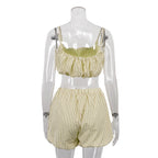 Yellow striped 3-piece lounge set on mannequin: ruffle crop top and high-waist shorts