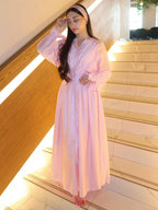 Pastel pink puff-sleeve button flowy dress with V-neck and gathered waist