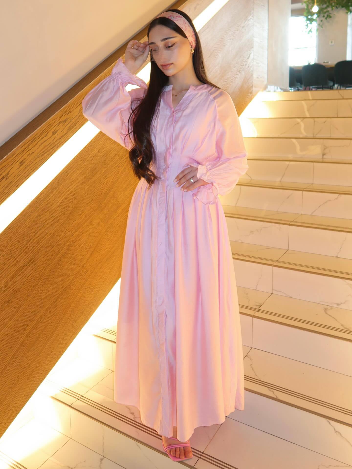 Pastel pink puff-sleeve button flowy dress with V-neck and gathered waist