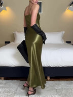Olive satin slip maxi dress with narrow straps and low V-neck, glossy skirt