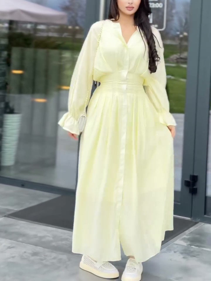 Pale yellow puff-sleeve button flowy dress with V-neck and gathered waist