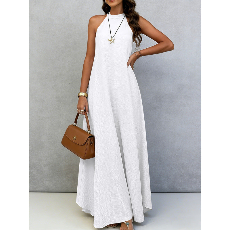 White sleeveless maxi dress with flowing A-line skirt and round neckline