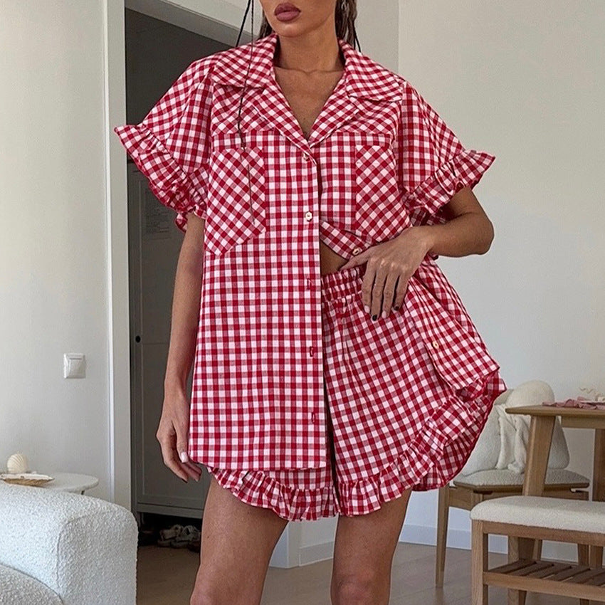 Red gingham ruffled button-front shirt with high-waisted shorts, flutter sleeves