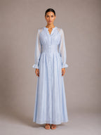Light blue puff-sleeve button flowy dress with V-neck and gathered waist