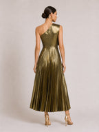 Gold one-shoulder pleated midi dress on model, back view with floral applique