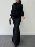 Black maxi dress with sheer high neck and long sleeves