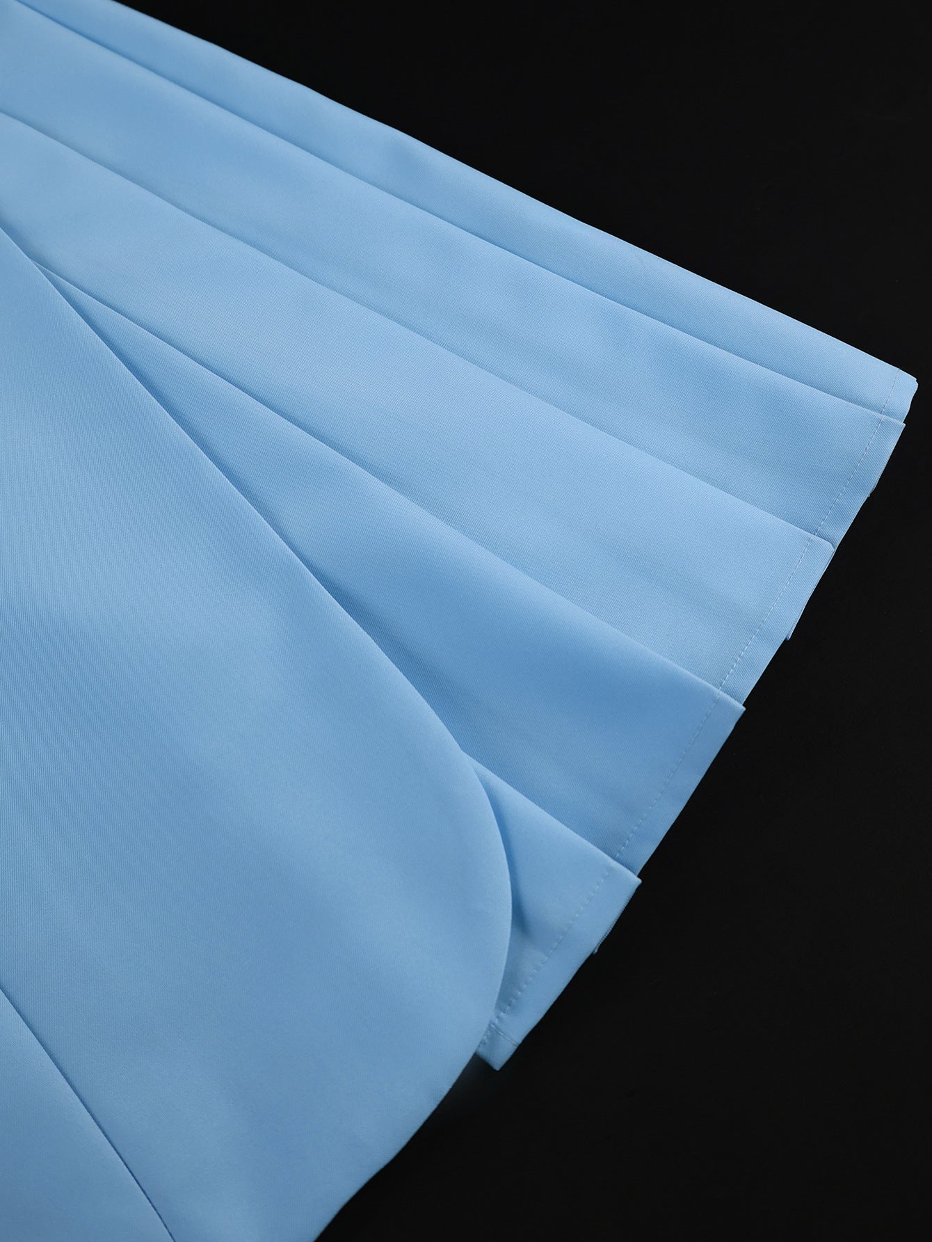 Blue blazer dress fabric with pleated skirt and smooth lapel collar