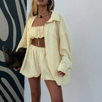 Yellow striped lounge set with off-shoulder ruffle crop top and matching shorts