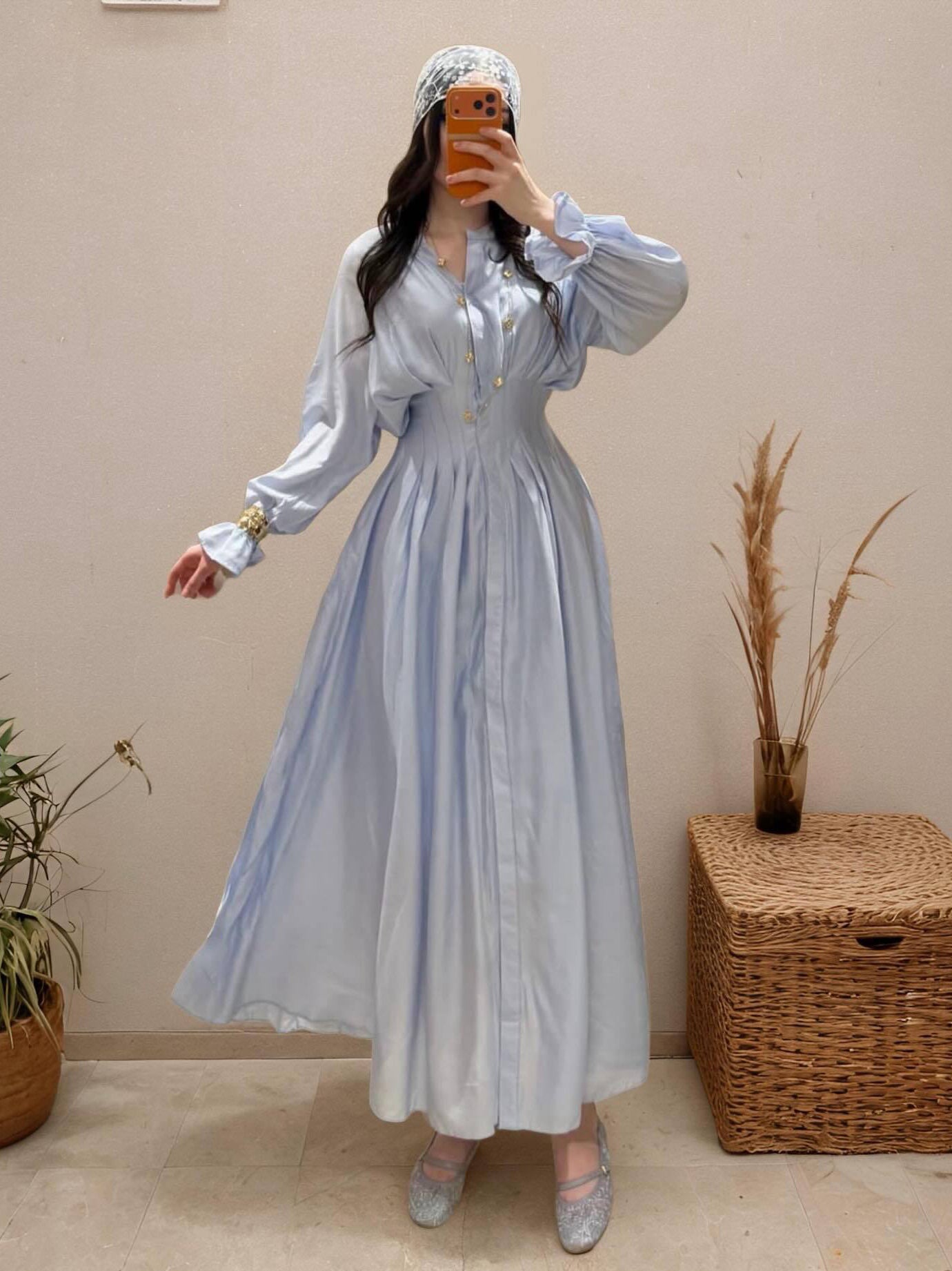 Light blue puff-sleeve button flowy dress with V-neck and gathered bodice