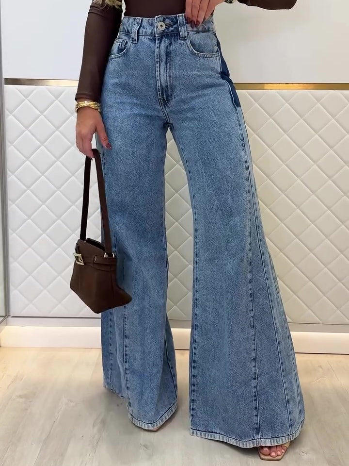 Light blue high-waist flared jeans with front patch pockets and wide flared legs