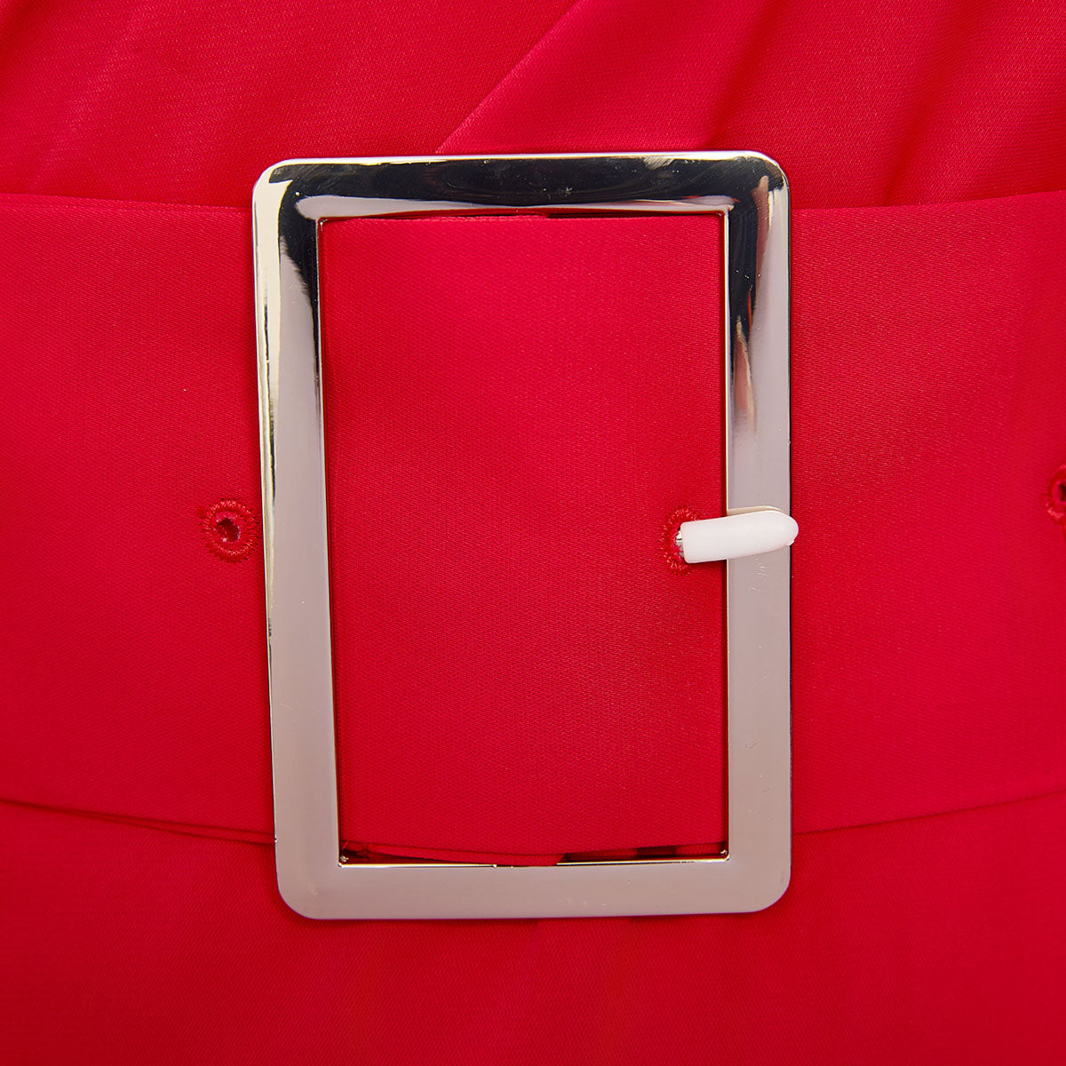 Silver rectangular belt buckle on red wide strap