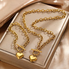 Gold-tone heart pendant bracelet and necklace set in gift box with heart charms
