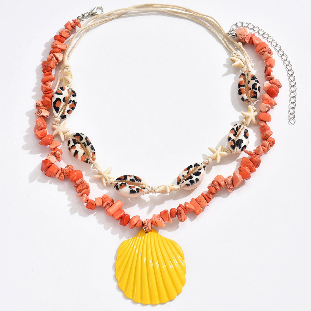 Orange beaded conch rope necklace with starfish charms and yellow scallop shell pendant