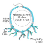 Turquoise coral branch charm bead necklace on a silver chain with clasp