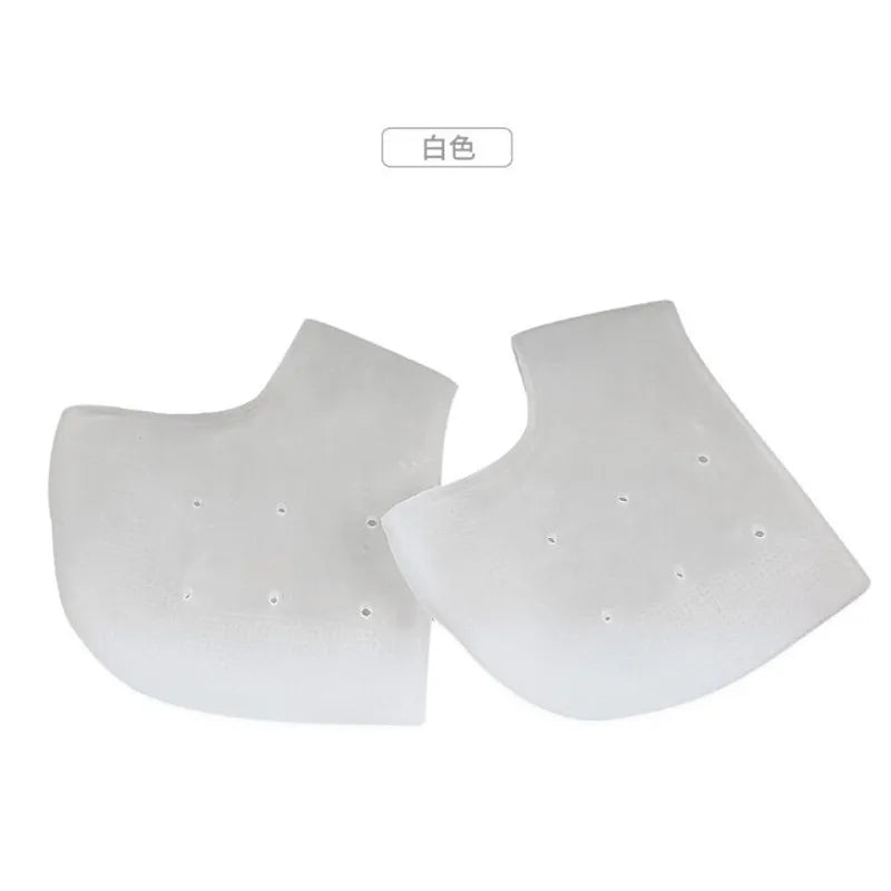 Gel heel socks pair in white, with small vent holes on each heel pad