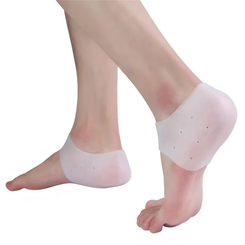 White gel heel socks with cushioned toe-and-heel pads and dotted massage nubs