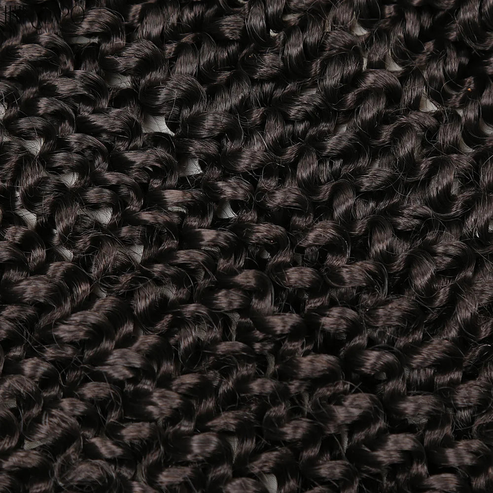 Crochet hair extensions with tight water-wave curls in dark black with subtle brown.