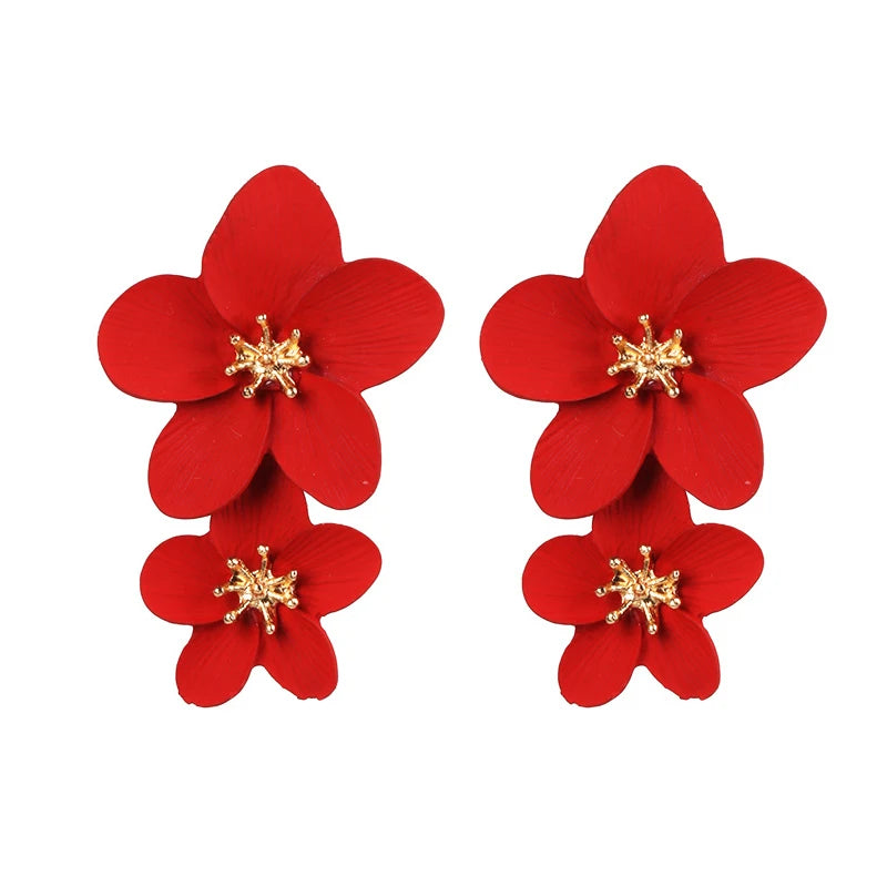 Red double-layer flower dangle earrings with gold-tone star centers