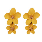 Yellow double-layer flower dangle earrings with gold-tone star centers