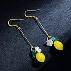 Lemon and leaf drop earrings, gold-tone with yellow acrylic lemon charms and white flowers
