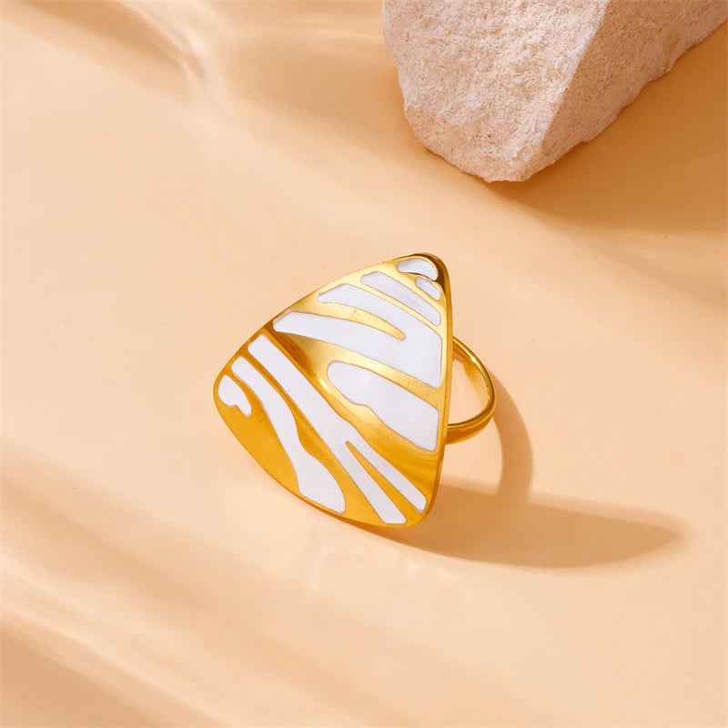 White tiger stripe statement ring, gold-tone bezel with white cutout panel