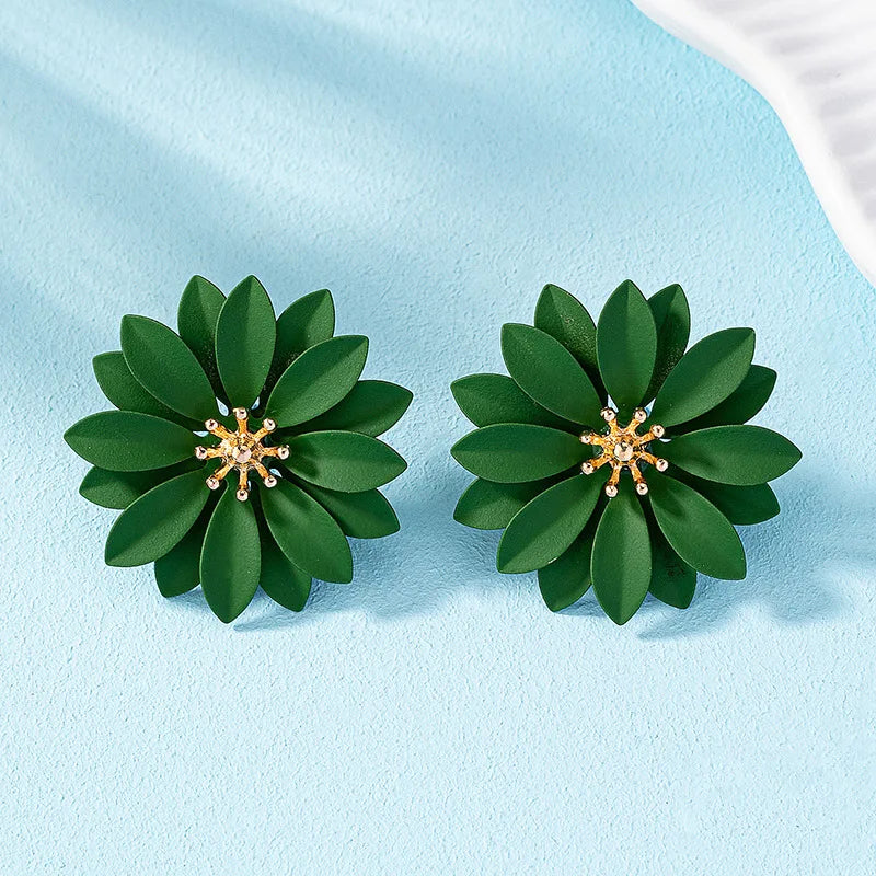 Green enamel flower stud earrings, two layered flowers with gold-tone sparkle centers.