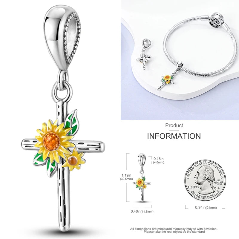 Sterling silver cross charm with sunflower and green enamel details