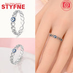 925 sterling silver evil eye band ring with blue eye and heart link design