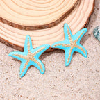 Starfish stud earrings with light blue starfish and silver-tone textured accents
