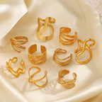 Geometric open stacking rings assortment, gold-tone curved ribbed bands