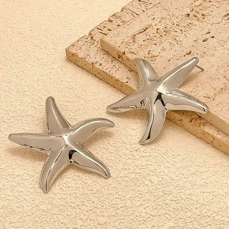 Boucles d'oreilles pendantes bohème à pompons — Étoile de mer et coquillage