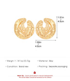 Gold heart oval wrinkled drop earrings, pair with textured swirl detail