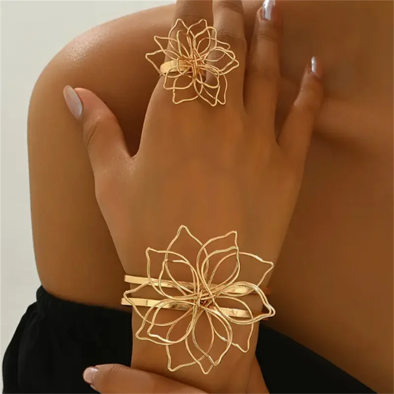 Gold hollow flower bracelet and ring set, gold-tone cuff with matching flower rings