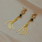 Pair of gold-tone hoop drop earrings with green square zircon center and long chain tassels