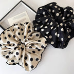 Polka dot scrunchie set: one black bow and one cream bow with elastic gathers
