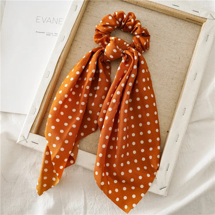 Chiffon ribbon scrunchie scarf, orange with white polka dots and gathered top knot