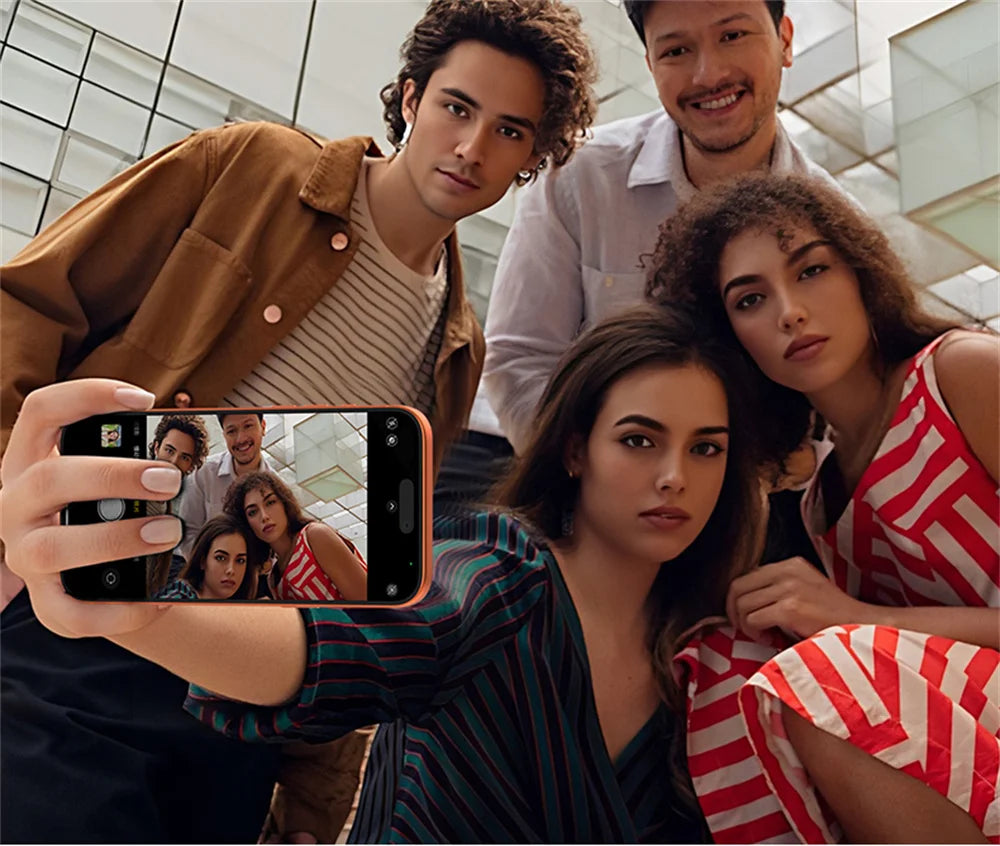 Smartphone with attached selfie monitor screen showing selfie preview