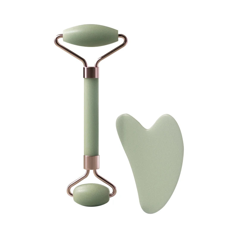 Facial massage roller set with green heart-shaped scraper and rounded base roller
