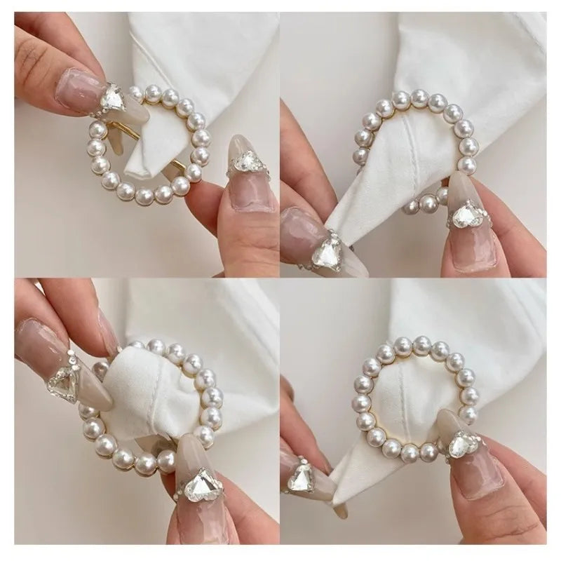 Pearl heart scarf brooch clip with crystal accents and gold-tone pin on fabric