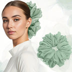 Oversized chiffon scrunchie in green, ruffled flower shape on hair