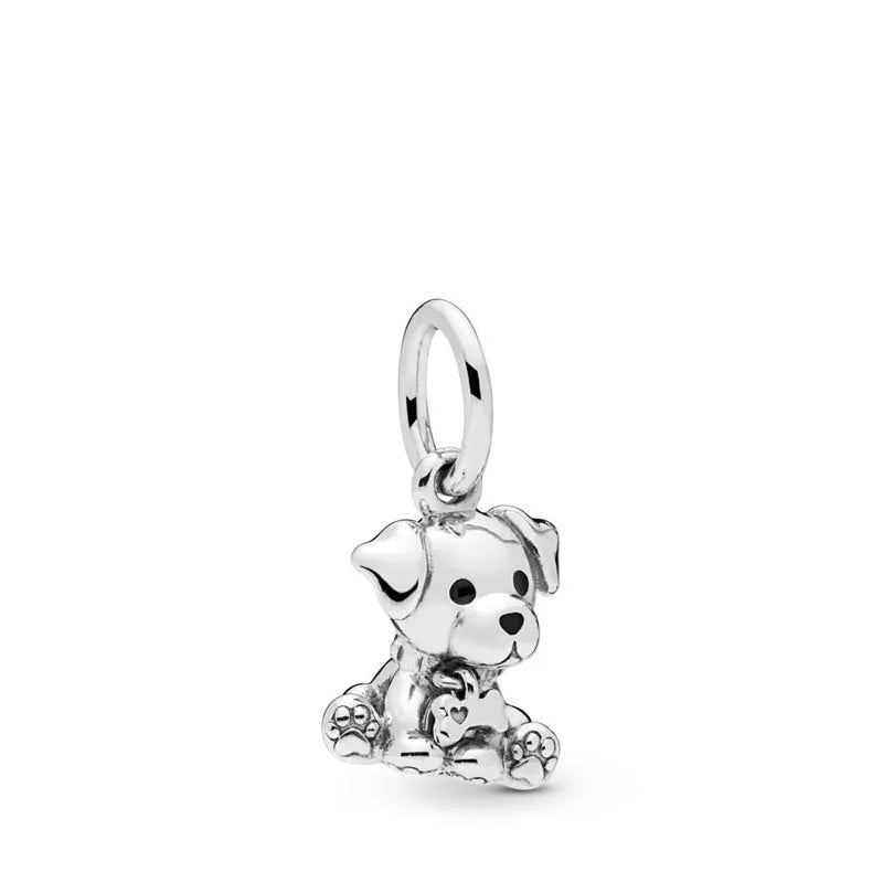 Sterling silver dog charm pendant with a small hanging loop