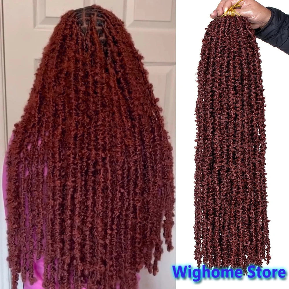 Deep burgundy butterfly locs crochet hair with long curly strands, held up for display